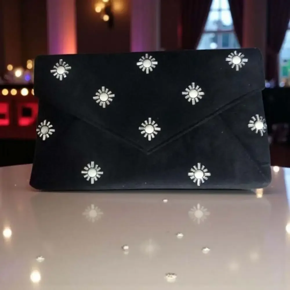 Betsey Johnson Black Clutch with White Floral Design